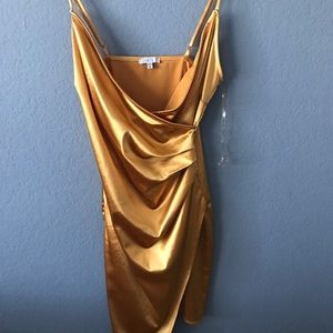 Iris gold dress. Size medium. Only worn once but in great condition.